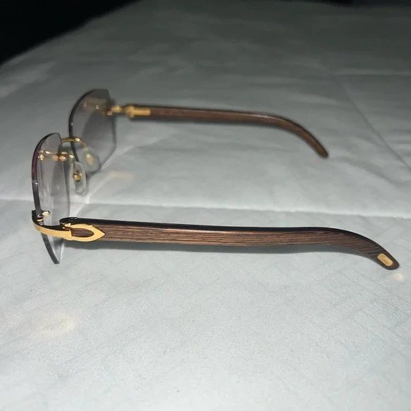 Cartier CT0052O rimless wood glasses